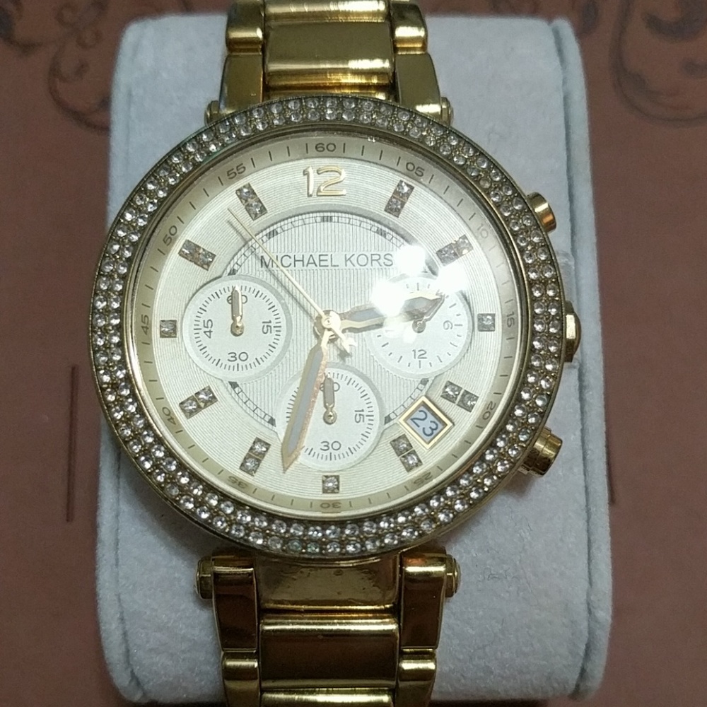 MK gold watch